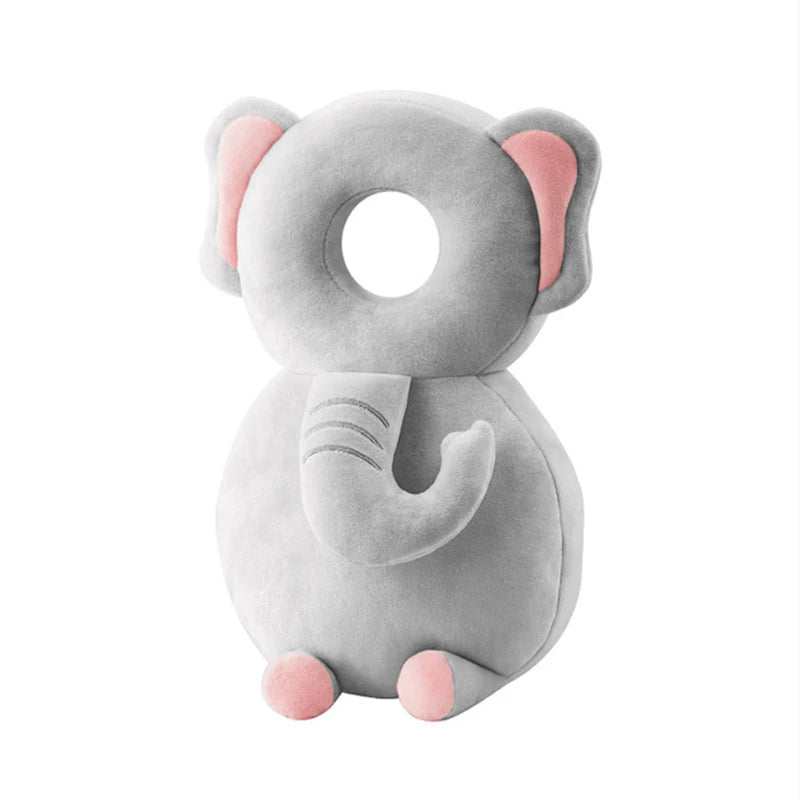Gray elephant-shaped pillow with pink accents on a white background