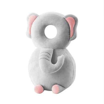 Gray elephant-shaped pillow with pink accents on a white background