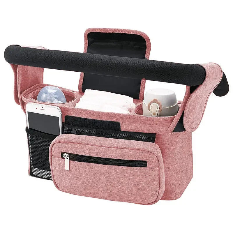 Pink car seat organizer with black accents on a white background