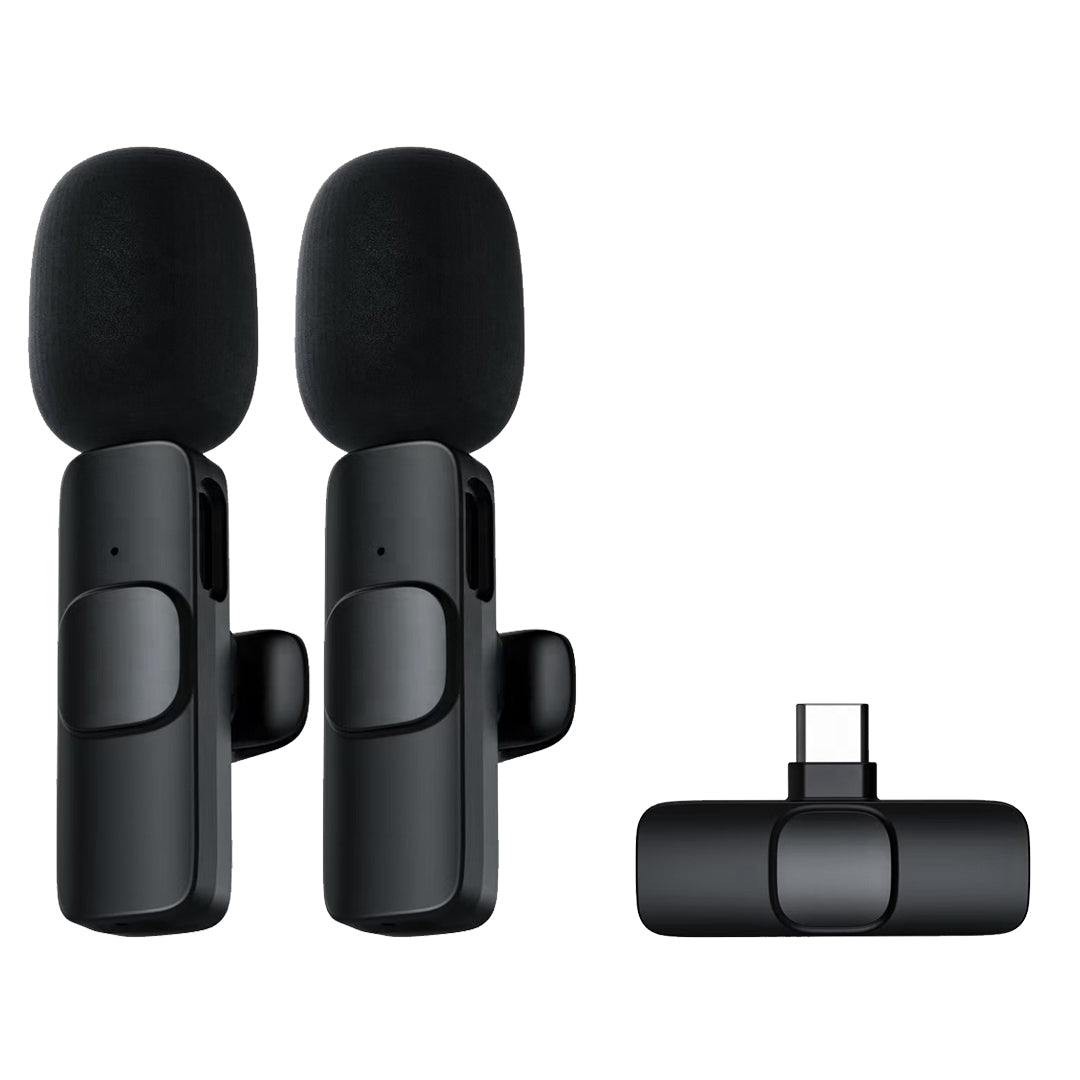 Set of two wireless microphones and a receiver on a white background