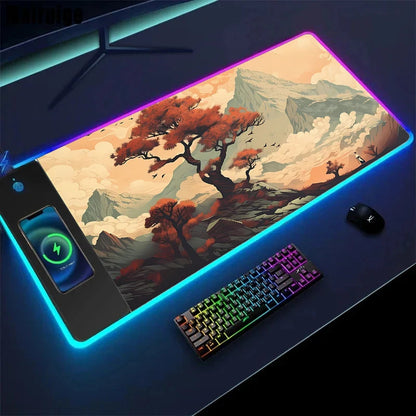 Gaming setup with a large mouse pad featuring a scenic design, keyboard, and phone on a dark surface.