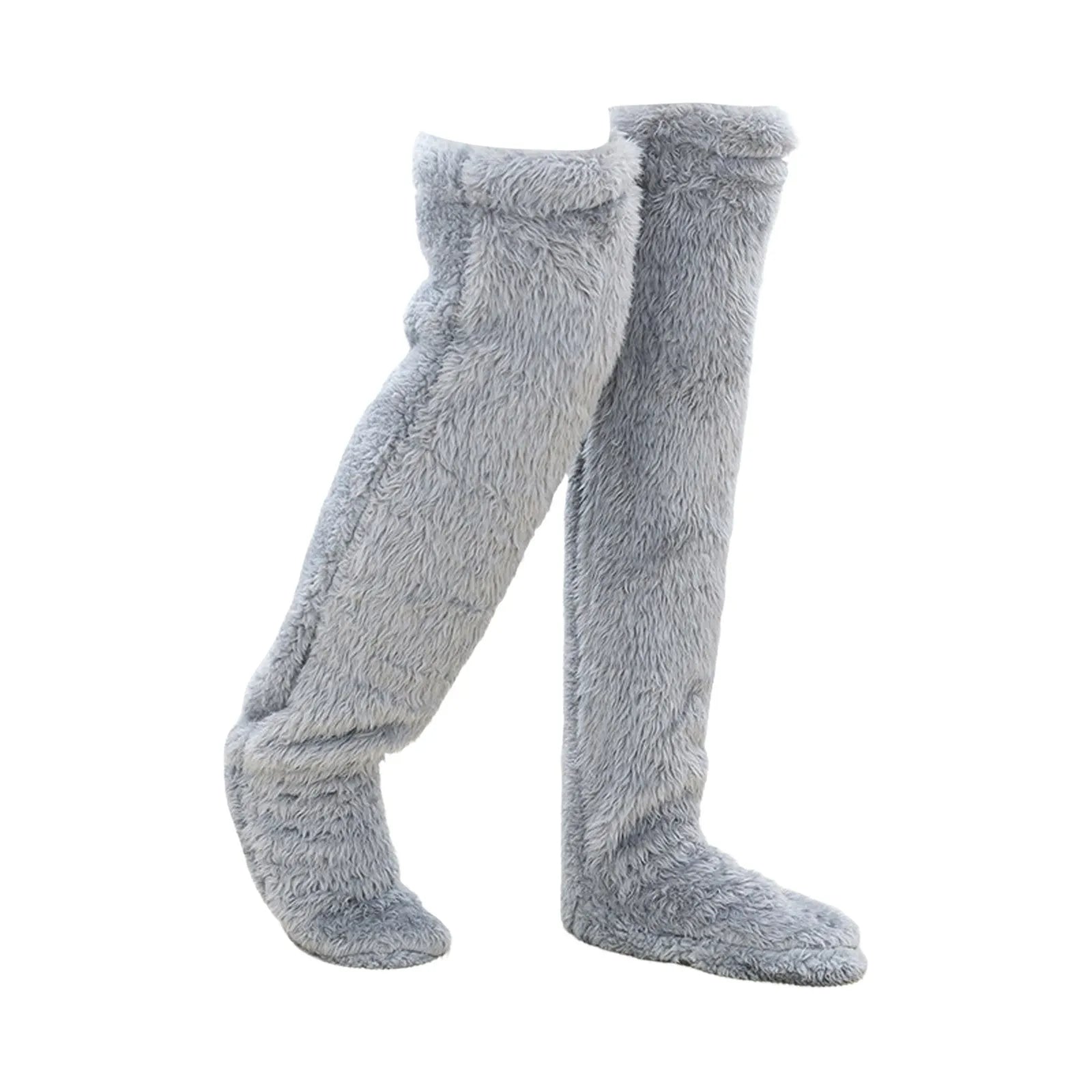Gray fuzzy knee-high socks on a white background