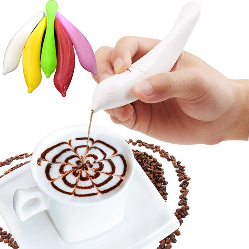 Hand using a white pen-like tool to create a design on a cup of coffee with colorful nozzles above.