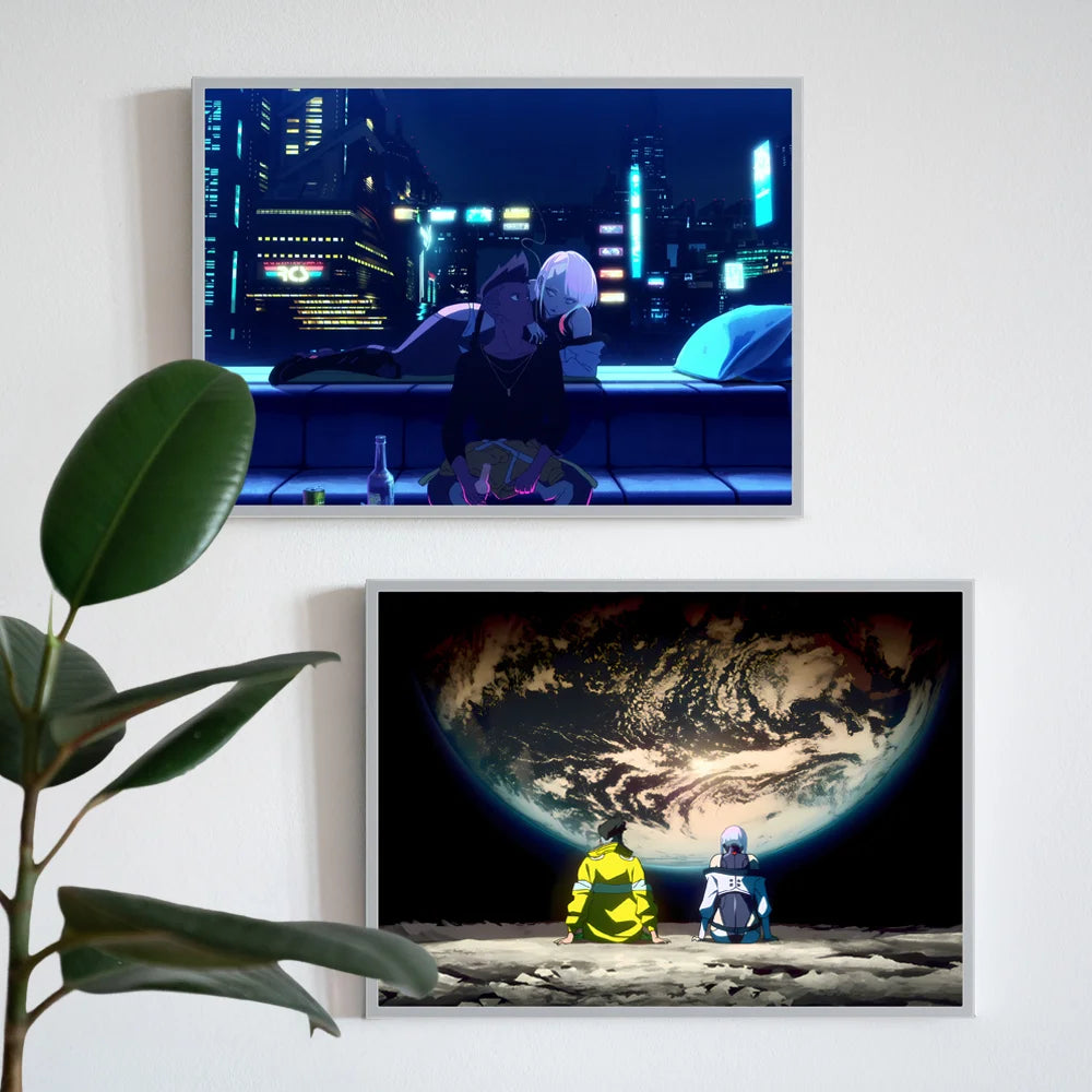 Two framed artworks on a wall, one with a futuristic cityscape and the other with a person on the moon.