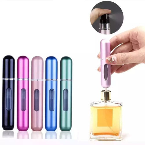 Set of colorful perfume bottles with a hand holding one, on a white background.