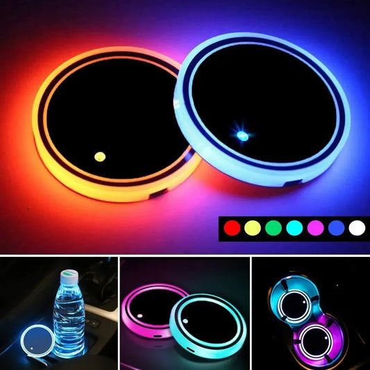 Color-changing LED coasters with a bottle of water and fidget spinner for scale.