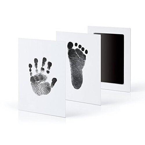 Baby hand and foot print kit with ink pads on a white background