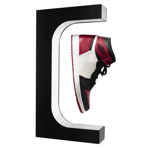 Magnetic levitation floating shoe display stand with LED lights showcasing sneaker in mid-air