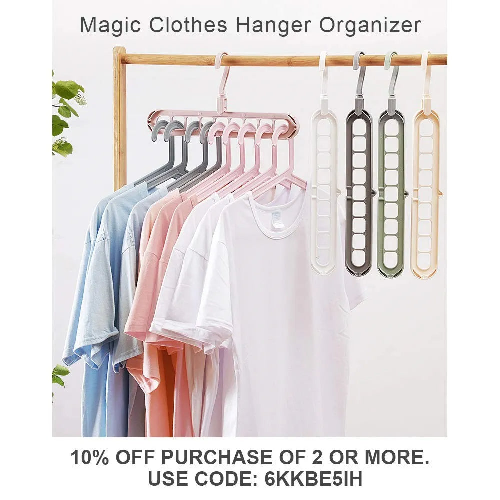 Magic Clothes Hanger Organizer with clothes on a rack against a white background