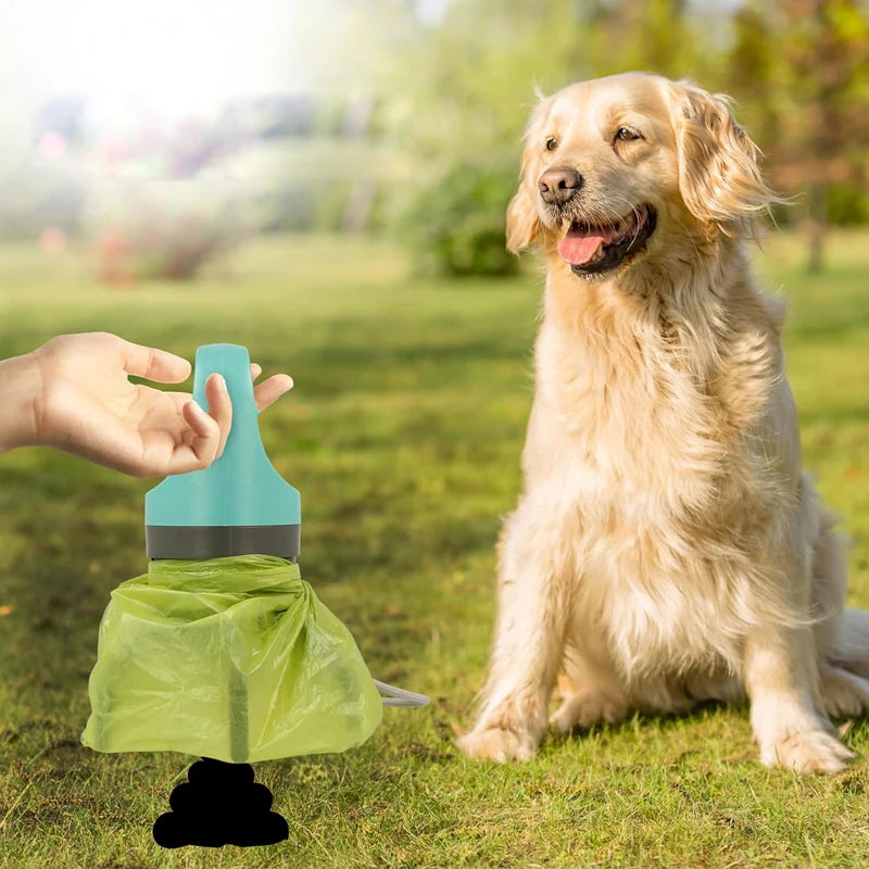 Dog sitting on grass with a hand holding a green pet waste bag dispenser