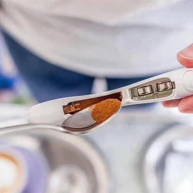 Spoon with spices held over a blurred background