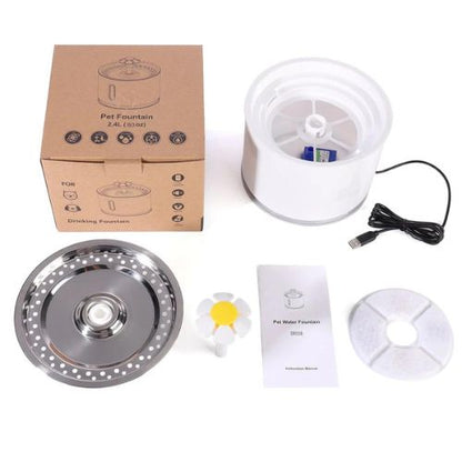 Pet water fountain set with packaging, components, and USB cable on a white background