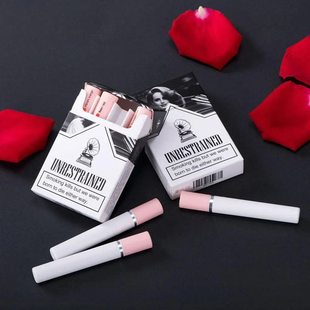Unrestrained electronic cigarettes with red rose petals on a black background
