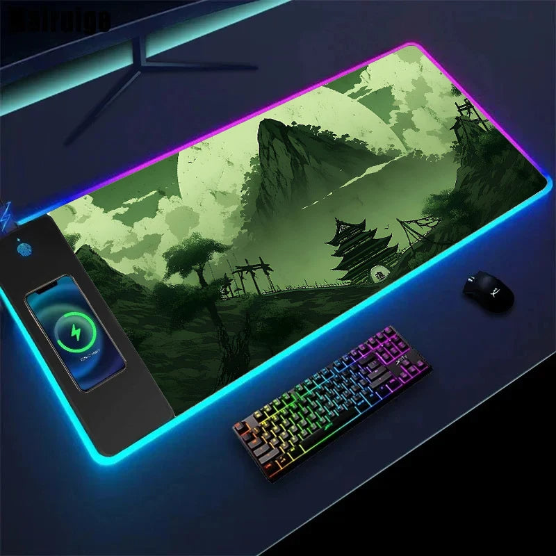 Gaming desk setup with a large mouse pad featuring a scenic design, keyboard, and mouse.
