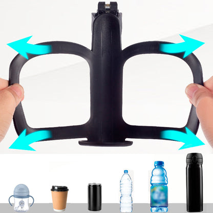 Black bicycle bottle holder with hands holding it, showing its adjustable design, on a white background.