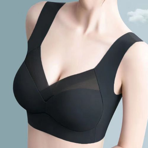 Black bra on a mannequin against a light blue background