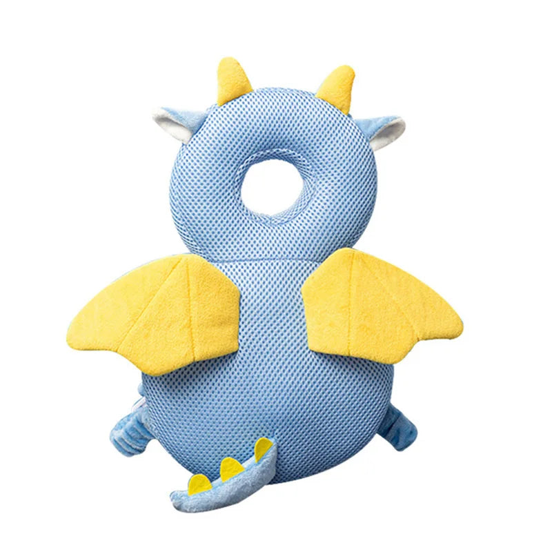 Blue and yellow dragon-shaped baby pillow on a white background