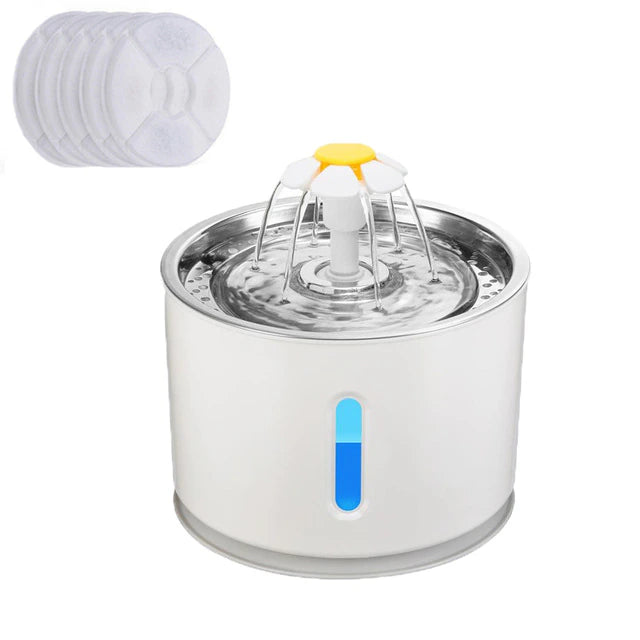 Pet water fountain with filter cartridges on a white background