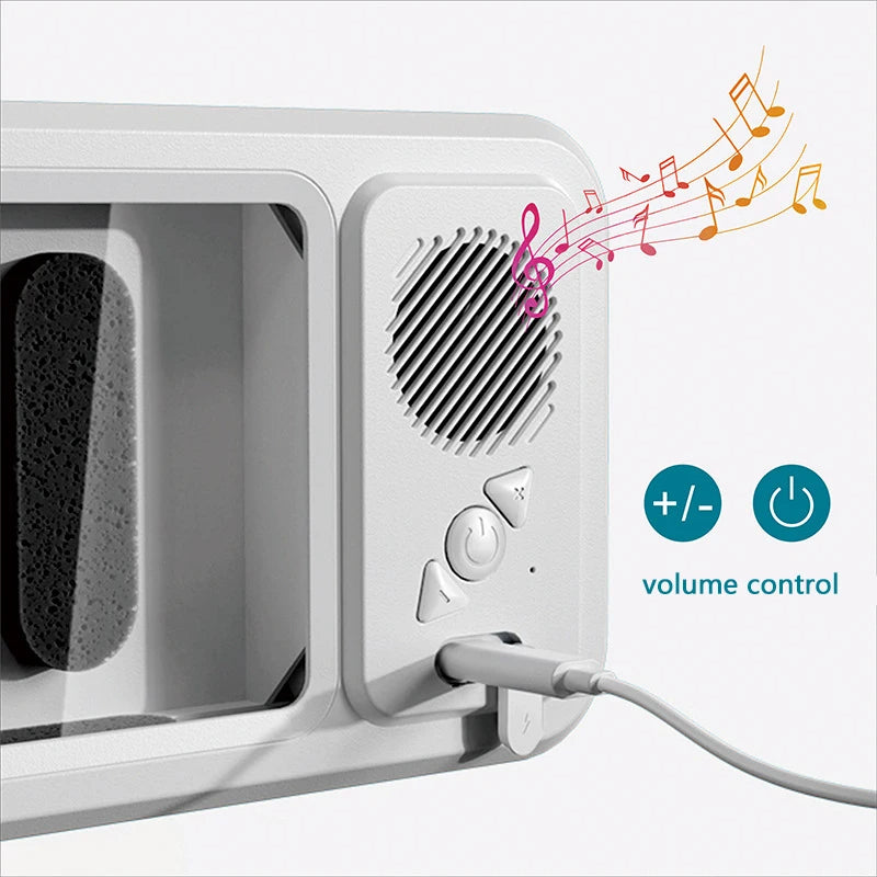 White microwave with a speaker and volume control buttons, featuring musical notes.