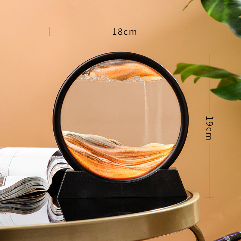 Round decorative object with a mirror on a stand, placed on an open book against a beige background.