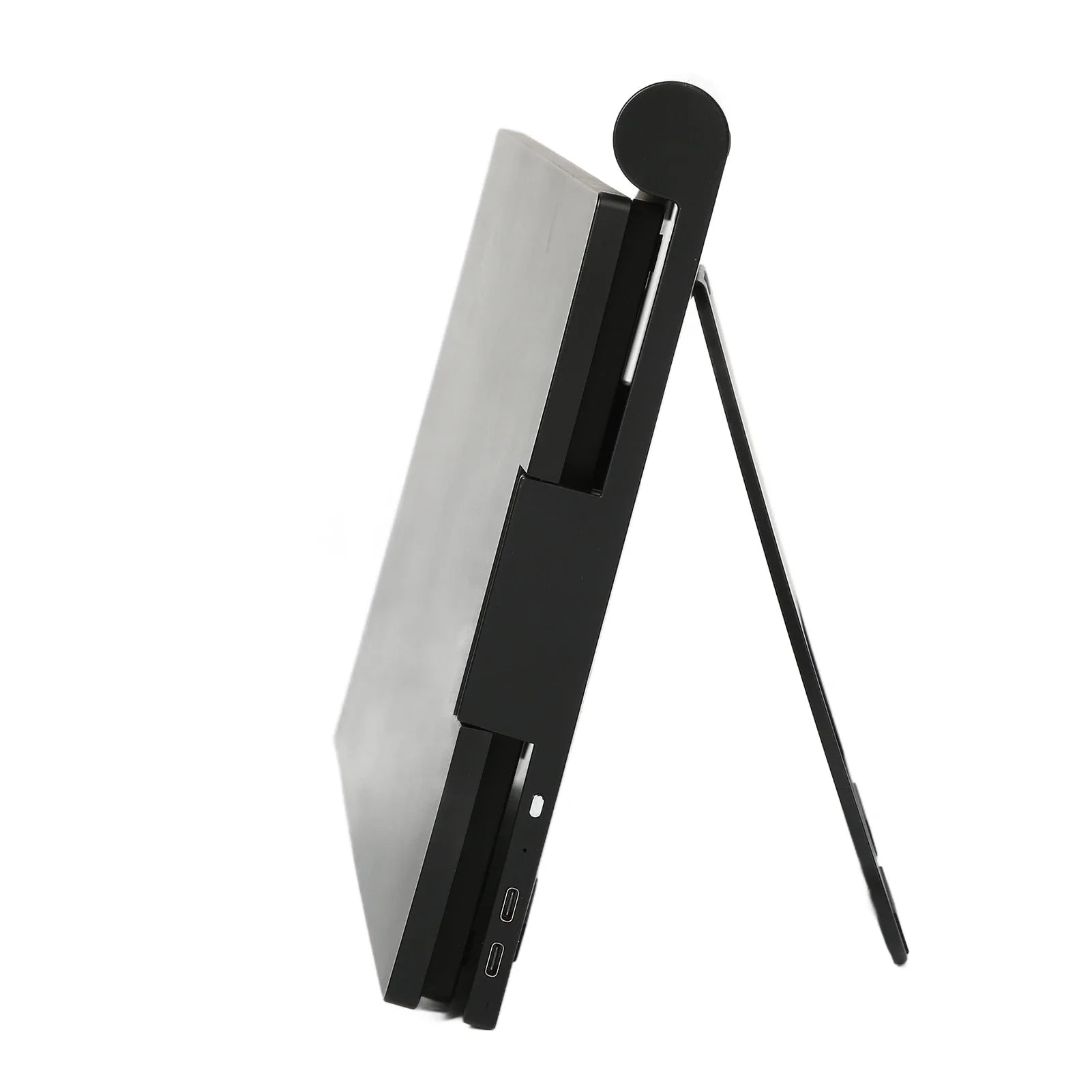 Black and silver electronic device with a stand on a white background