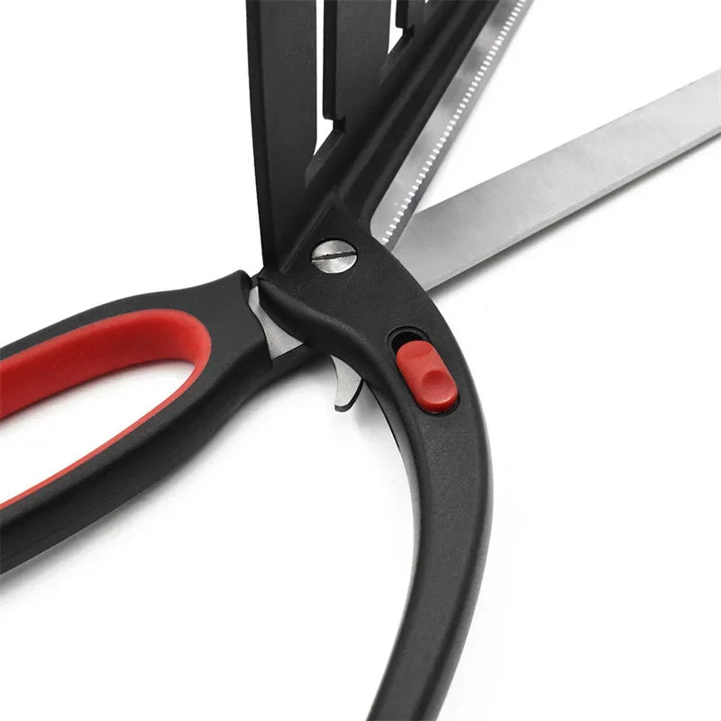 Black and red scissors on a white background