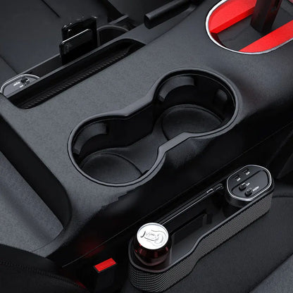 Car cup holder with drink and phone in a modern vehicle interior