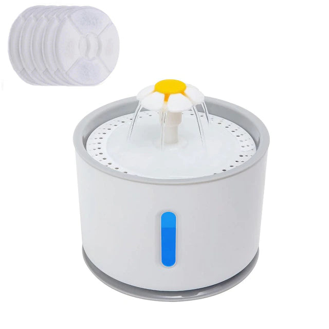 Pet water fountain with filter cartridges on a white background