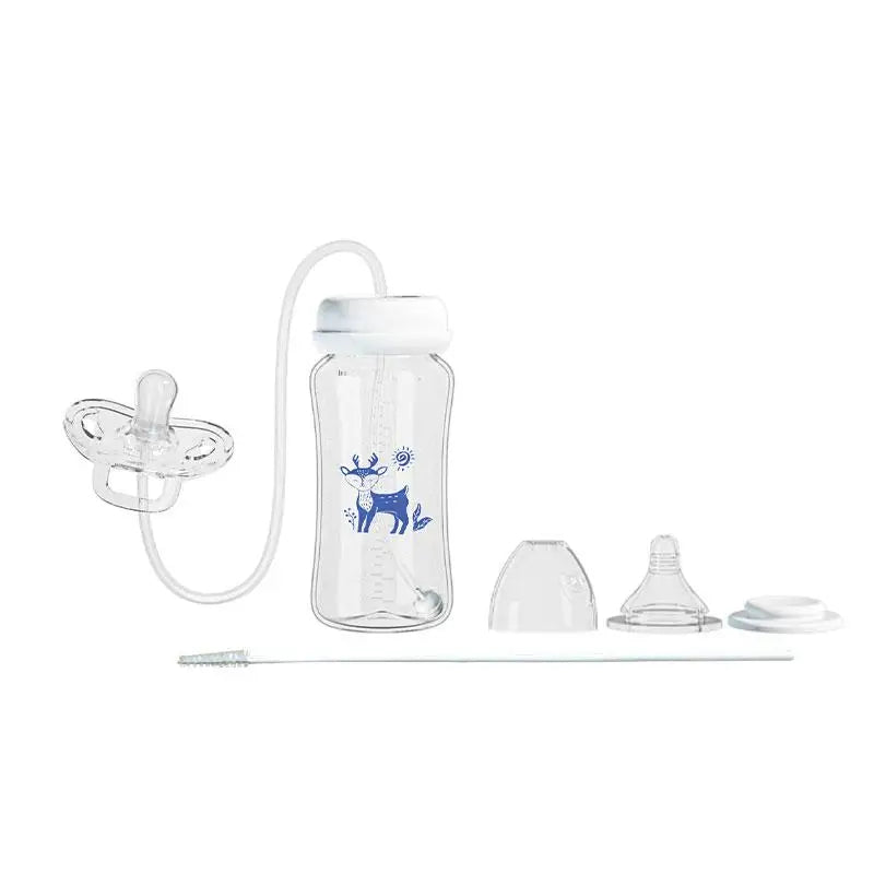 Clear baby bottle with blue design and accessories on a white background