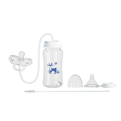 Clear baby bottle with blue design and accessories on a white background
