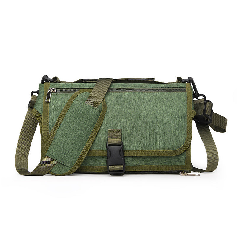 Green messenger bag with a strap on a white background
