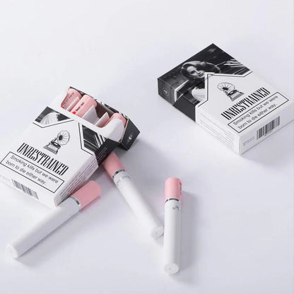 Pink and white vape devices with 'Ungestrained' packaging on a white background