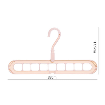 Pink multi-clip hanger with measurements on a white background