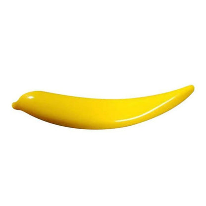 Yellow banana-shaped object on a white background