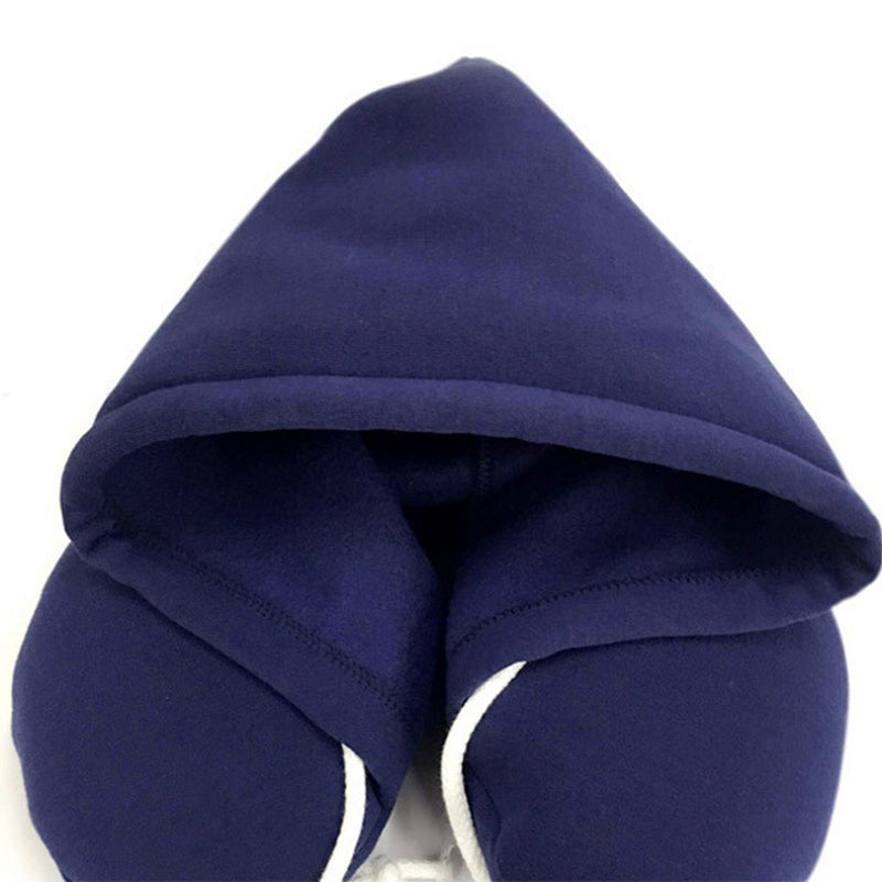 Navy blue travel pillow on a white background